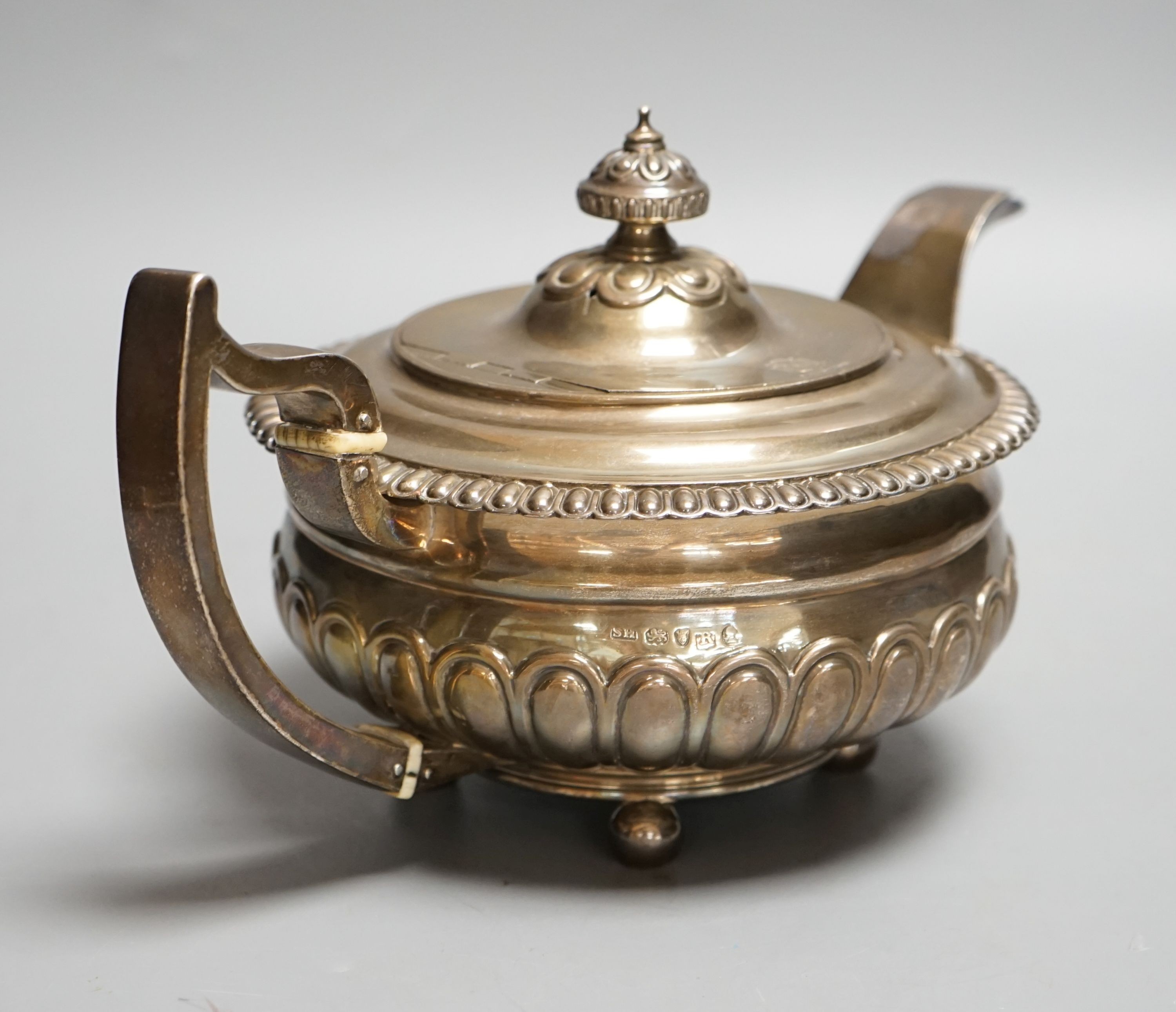 A George III silver teapot, Soloman Hougham, London, 1813, gross 23.5oz.